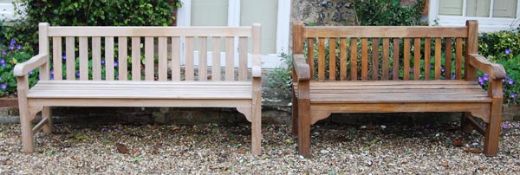Two similar teak garden benches, of recent manufacture, both with slatted backs and seats, one 94cm