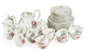 A Limoges porcelain part tea service, for twelve placings, comprising cup, saucers, side plates,