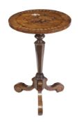 A Continental walnut and marquetry decorated candle stand, 19th century, circular top with floral