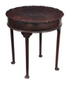 A mahogany piecrust table, in George III style, 19th century and later, shaped circular top with a