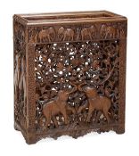 An Indian carved hardwood stickstand, late 19th/early 20th century, of rectangular form, carved