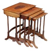 A nest of four mahogany and tulipwood crossbanded quartetto tables, in George III style, first half