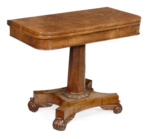 A George IV pollard oak folding games table, circa 1825, the D shaped top opening to a baize inset