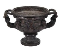 A French patinated bronze model of the Albani urn, circa 1870, the beaded and everted rim with twin