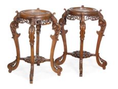 A pair of Chinese hardwood and marble inset gueridons, late 19th/early 20th century, each with