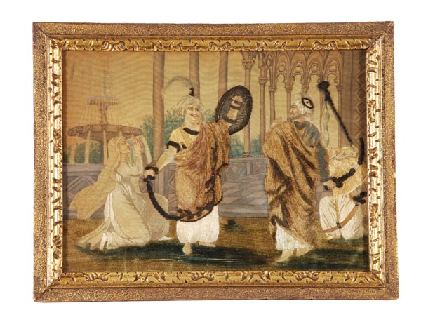 A painted silk and chenille picture, early 19th century, designed with a theatrical scene of a