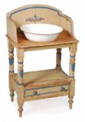 A Victorian green painted pine washstand, circa 1850, three quarter gallery, circular aperture to