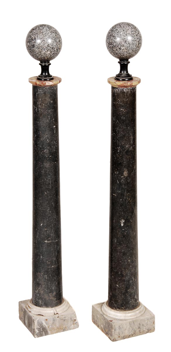 A pair of Continental black and Breccia marble mounted columnar pedestals, late 19th century, with