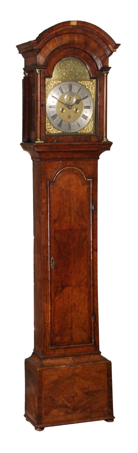 A Queen Anne walnut eight-day longcase clock Anthony Herbert, London, circa 1705 The five finned