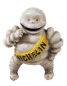 [Michelin]. A cast-iron model of `Bibendum`, the Michelin Man, of recent manufacture, white with a