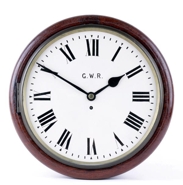 A Great Western Railway wall clock, with a fusee movement, the repainted circular white dial with