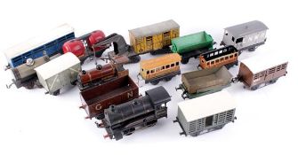 Assorted O gauge and other locomotives, rolling stock and lineside accessories, including a Hornby