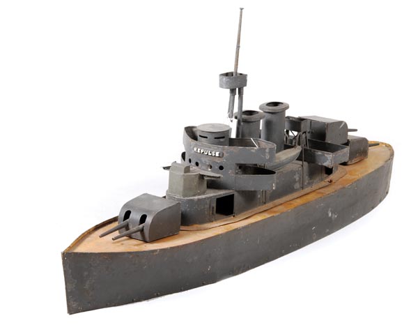 A contemporary First World War period `carpet` toy model of the battleship H.M.S. Repulse, built-up