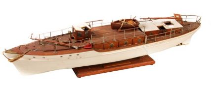 A well built model of a motor yacht, circa 1930, with deck superstructure, life-boat, cabins, wheel