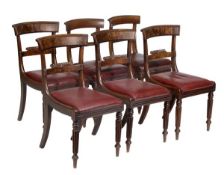 A set of four George IV mahogany dining chairs, circa 1825, in the manner of Gillows, rectangular