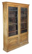 A George III mahogany and glazed cabinet bookcase, approximately 193cm high, 135cm wide, 28cm