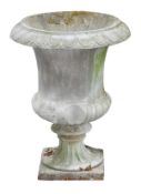 A stone composition garden urn, 20th century, of Campana form, flared rim, lobed and waisted body,