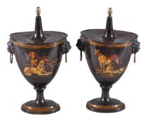 A pair of Regency japanned and parcel gilt chestnut urns, circa 1815, of oval section, the covers