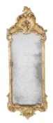 A Continental giltwood wall mirror, in 18th century style, 19th century, with shell and scroll
