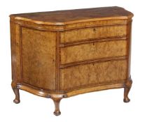 A burr elm, kingwood and tulipwood commode, of serpentine outline, the top with marquetry inset