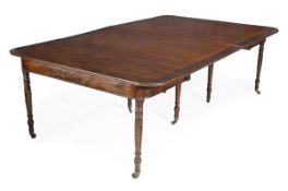 A Regency mahogany extending dining table, circa 1815, two D-shaped ends and two additional leaves,