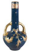 A French porcelain green-ground and gilt globular two-handled vase with slender cylindrical neck,