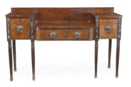 A Regency mahogany sideboard, circa 1815, rear gallery, central drawer flanked by a deep drawer and