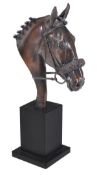 Denise Dutton, late 20th century, a patinated bronze model of the head of a racehorse, portrayed