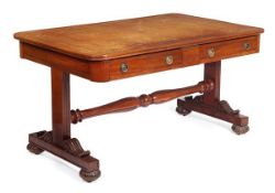 A William IV mahogany library desk, circa 1835, rectangular top with gilt tooled leather inset, two