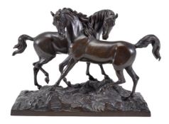 A Continental bronze group of two horses, late 19th century, portrayed standing, one looking across