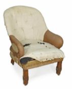 A Victorian oak framed armchair, after a design by Pugin, late 19th century, padded back and arms,