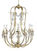 A gilt metal and cut glass mounted twelve branch chandelier, 20th century, comprising eighteen