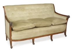 A mahogany and upholstered sofa, first half 19th century, rectangular back, downswept arms with