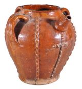 A large 19th century Continental brown-glazed pottery three-handled wine pot, 33cm high