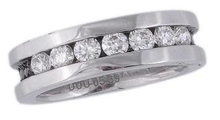 * A diamond ring, the ring set with seven brilliant cut diamonds and with black diamonds accents to