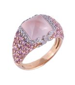 * A rose quartz and pink sapphire ring, the ring centrally set with a pyramid shaped rose quartz,