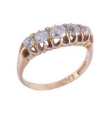 A five stone diamond ring, the graduated old cut diamonds in open claw settings, the shank