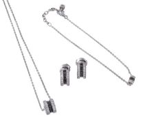 * A diamond and black diamond pendant necklace, the bead pendant set with black and white diamonds,