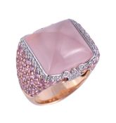 * A rose quartz and pink sapphire ring, the ring set with a pyramid shaped rose quartz and with
