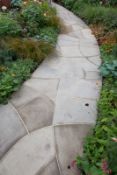 *Crackle glaze stone pathCurved path and circular paved area in sawn Blackstone buff sandstone,