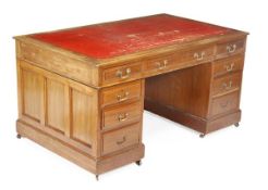 A Victorian mahogany pedestal desk, circa 1880, red leather inset, three frieze drawers above two