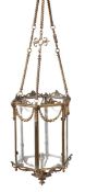 A Victorian gilt metal and glazed hall lantern, third quarter 19th century, of hexagonal section,