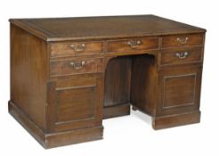 A George III mahogany partners’ desk, circa 1770, rectangular top, with tooled brown leather inset,