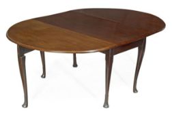 An Irish mahogany drop leaf table, circa 1750, hinged top with rounded ends, tapered legs