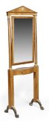 A birch cheval mirror in Empire style, first half 19th century, arched crest, rectangular plate,