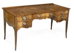 A mahogany and crossbanded serpentine fronted desk or serving table, late 19th/early 20th century,
