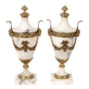 A pair of purple veined variagated marble and gilt metal mounted urns, 20th century, surmounted by