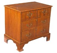 A walnut and holly strung chest of drawers, first half 18th century, moulded rectangular top, two