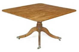 A Regency mahogany tilt top breakfast table, circa 1815, rectangular top with reeded edge, baluster