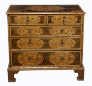 A William and Mary oyster veneered and marquetry chest of drawers, circa 1690, rectangular top with